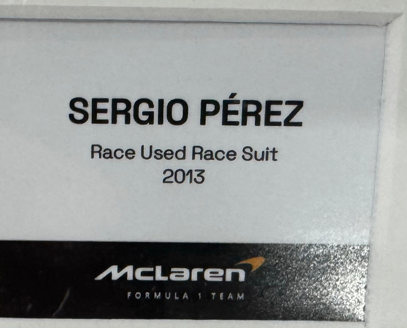 🔥 Traje de Carrera Original McLaren F1 2013, Usado por Sergio “Checo” Pérez durante su temporada con el equipo
